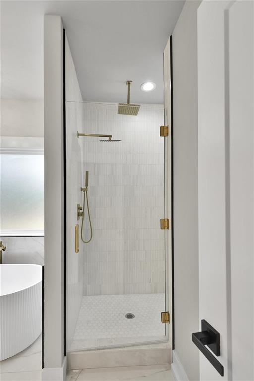 3369 Dodson Drive Connector East Point, GA 30344 - Photo 28 of 43 a bathroom with a glass shower door