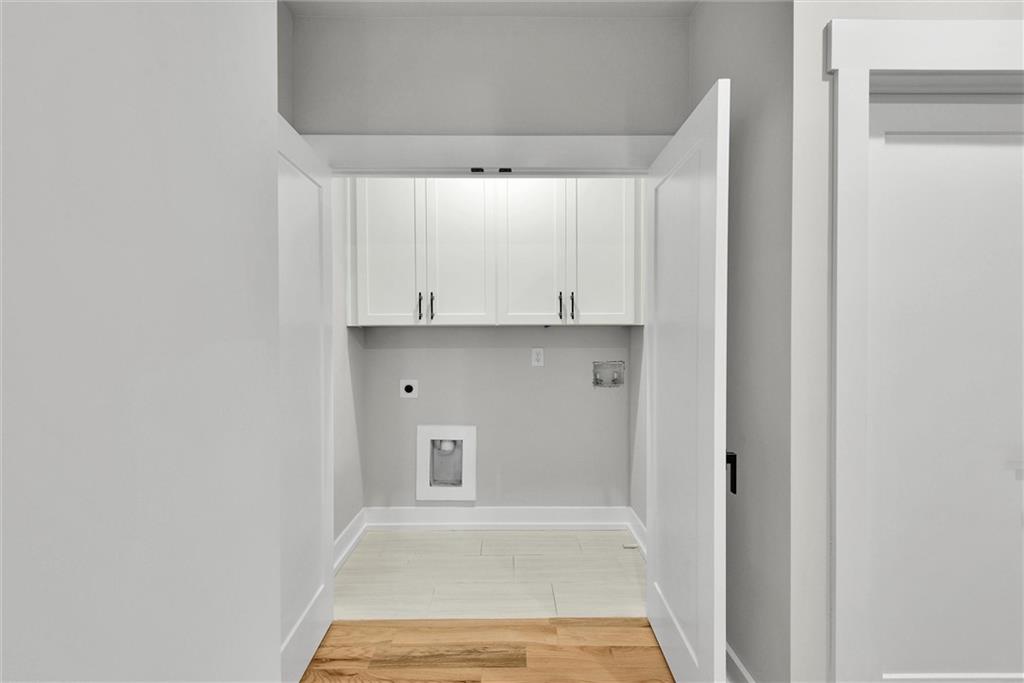 3369 Dodson Drive Connector East Point, GA 30344 - Photo 32 of 43 a view of storage and utility room with wooden floor