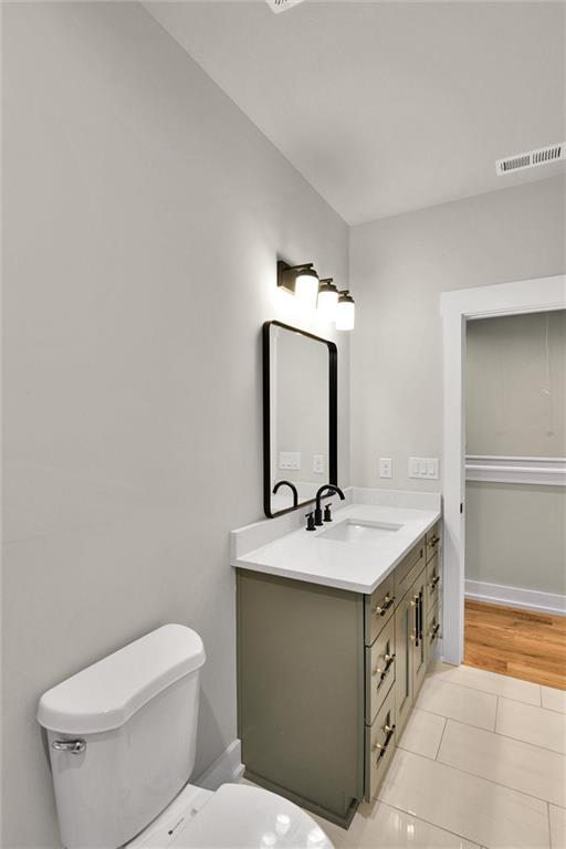 3369 Dodson Drive Connector East Point, GA 30344 - Photo 37 of 43 a bathroom with a granite countertop sink and a mirror