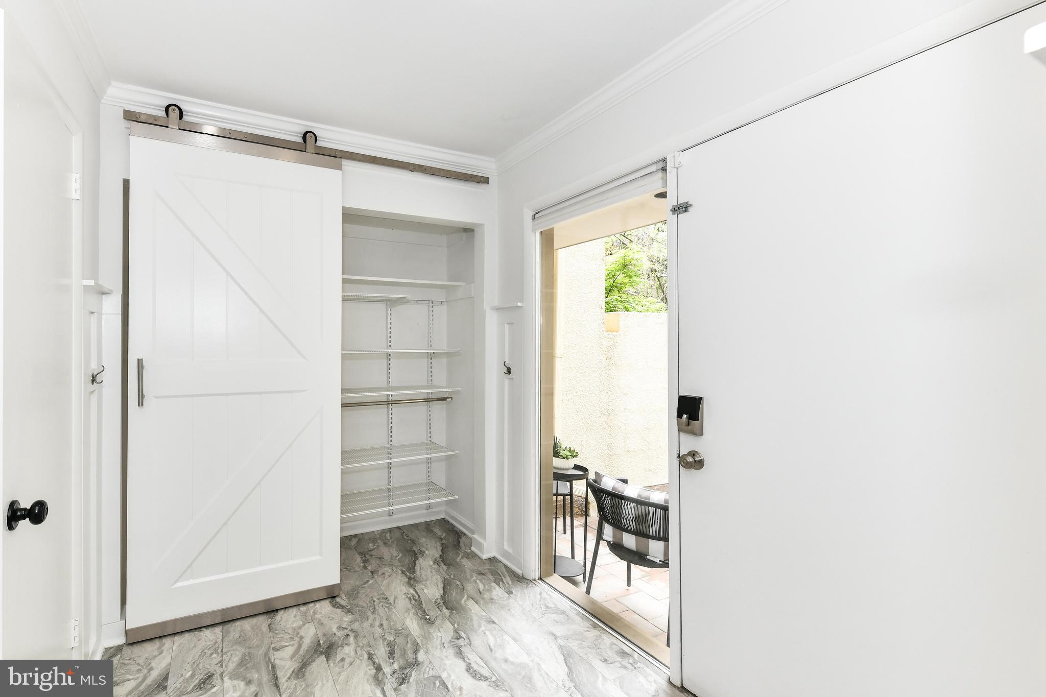 11701 Newbridge Court Reston, VA 20191 - Photo 18 of 64 Welcoming front entrance with storage