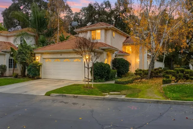 a view of a house with a yard