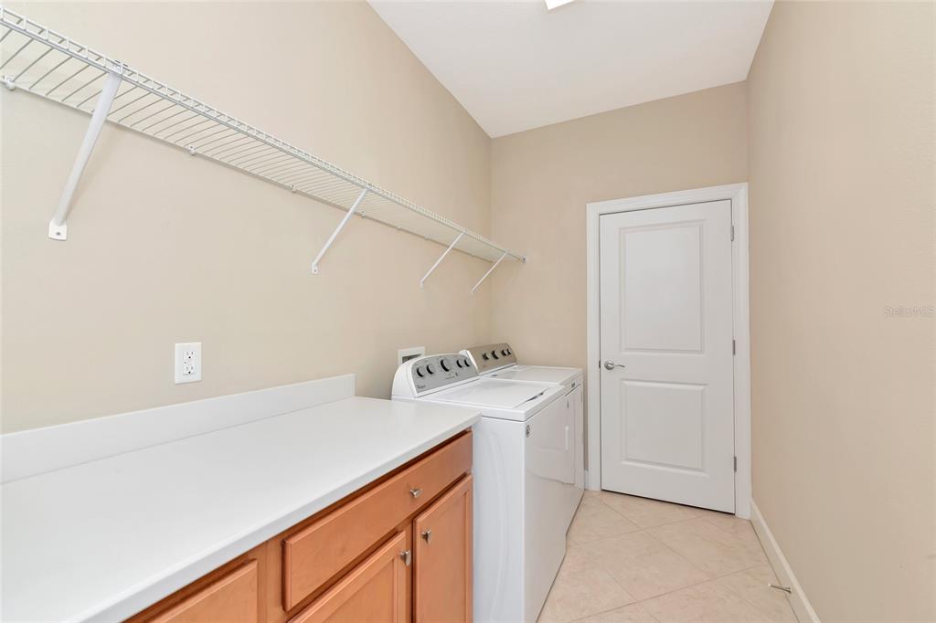 12848 Del Corso Loop Lakewood Ranch, FL 34211 - Photo 37 of 70 a utility room with dryer and washer