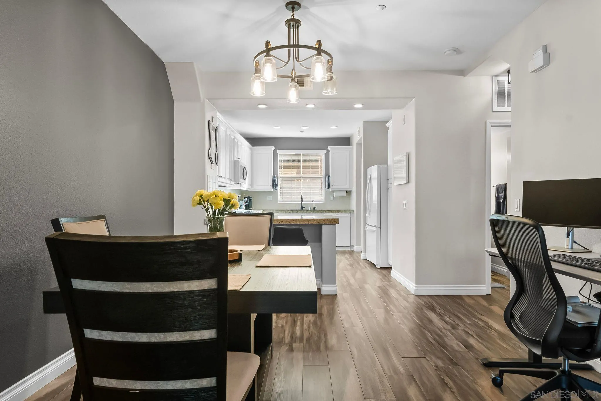 10240 Daybreak Lane, Unit 2 Santee, CA 92071 - Photo 17 of 48 a view of a dining room with furniture and wooden floor