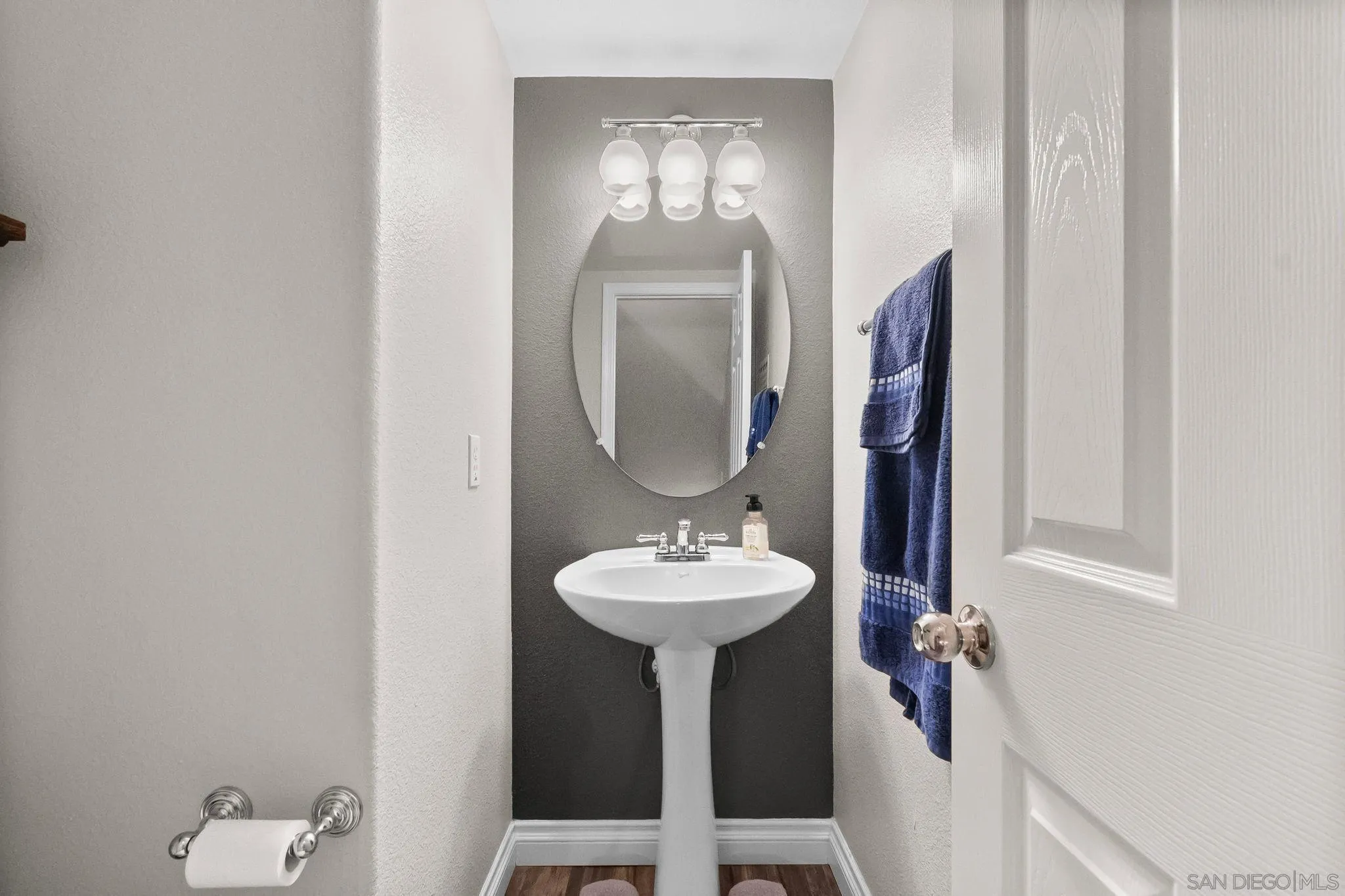 10240 Daybreak Lane, Unit 2 Santee, CA 92071 - Photo 18 of 48 a bathroom with a sink and a mirror