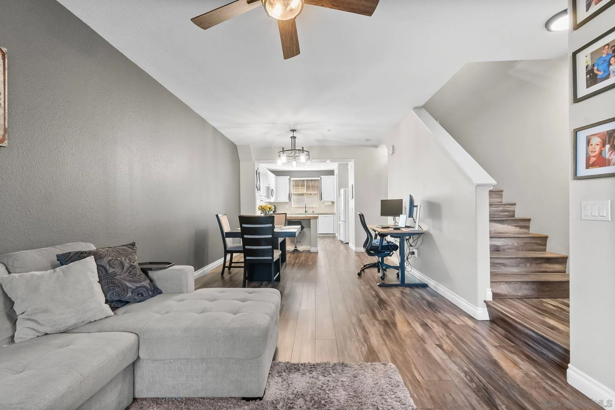10240 Daybreak Lane, Unit 2 Santee, CA 92071 - Photo 23 of 48 a living room with furniture and a wooden floor