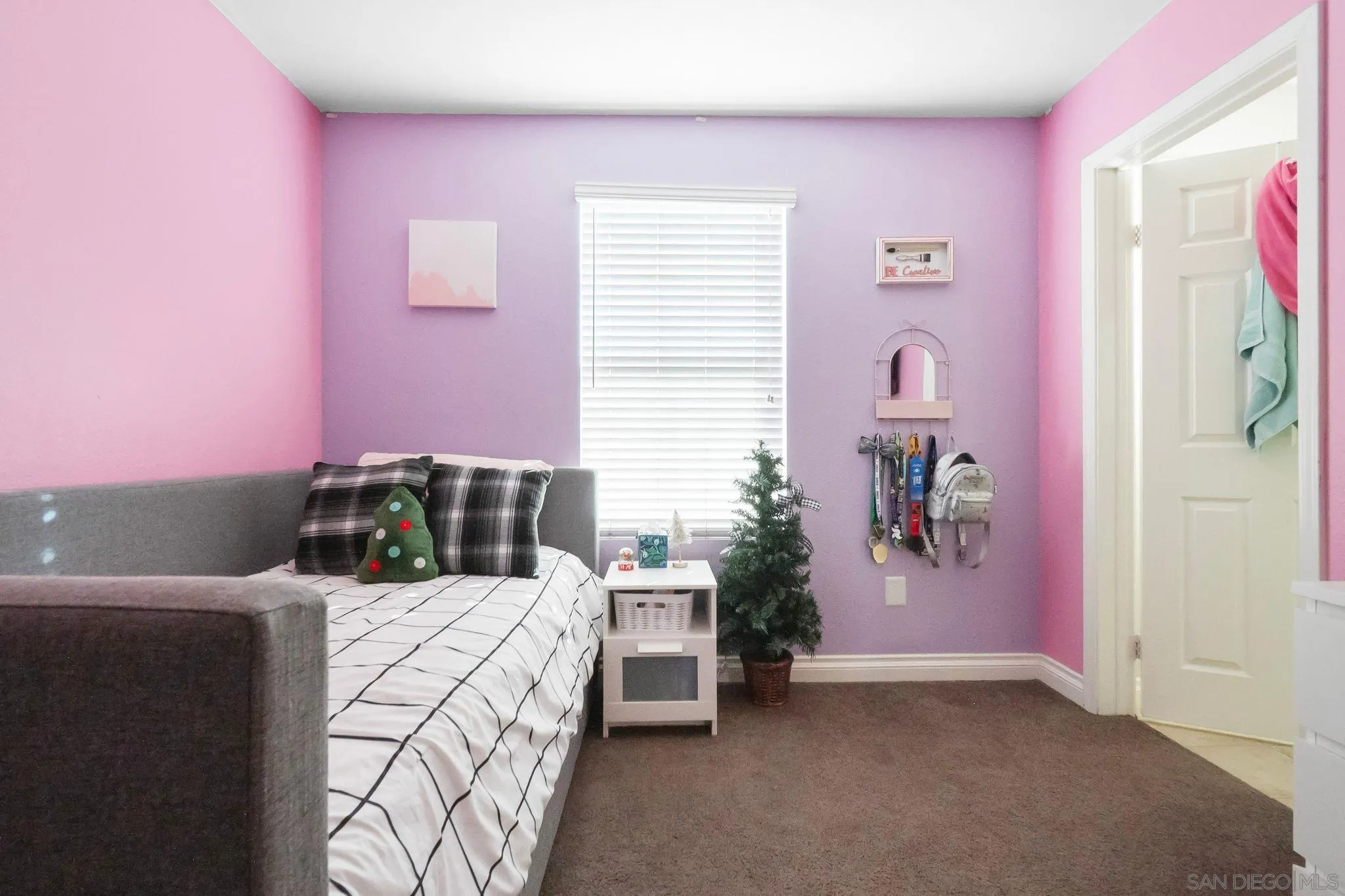 10240 Daybreak Lane, Unit 2 Santee, CA 92071 - Photo 32 of 48 a bed room with a bed and a chair