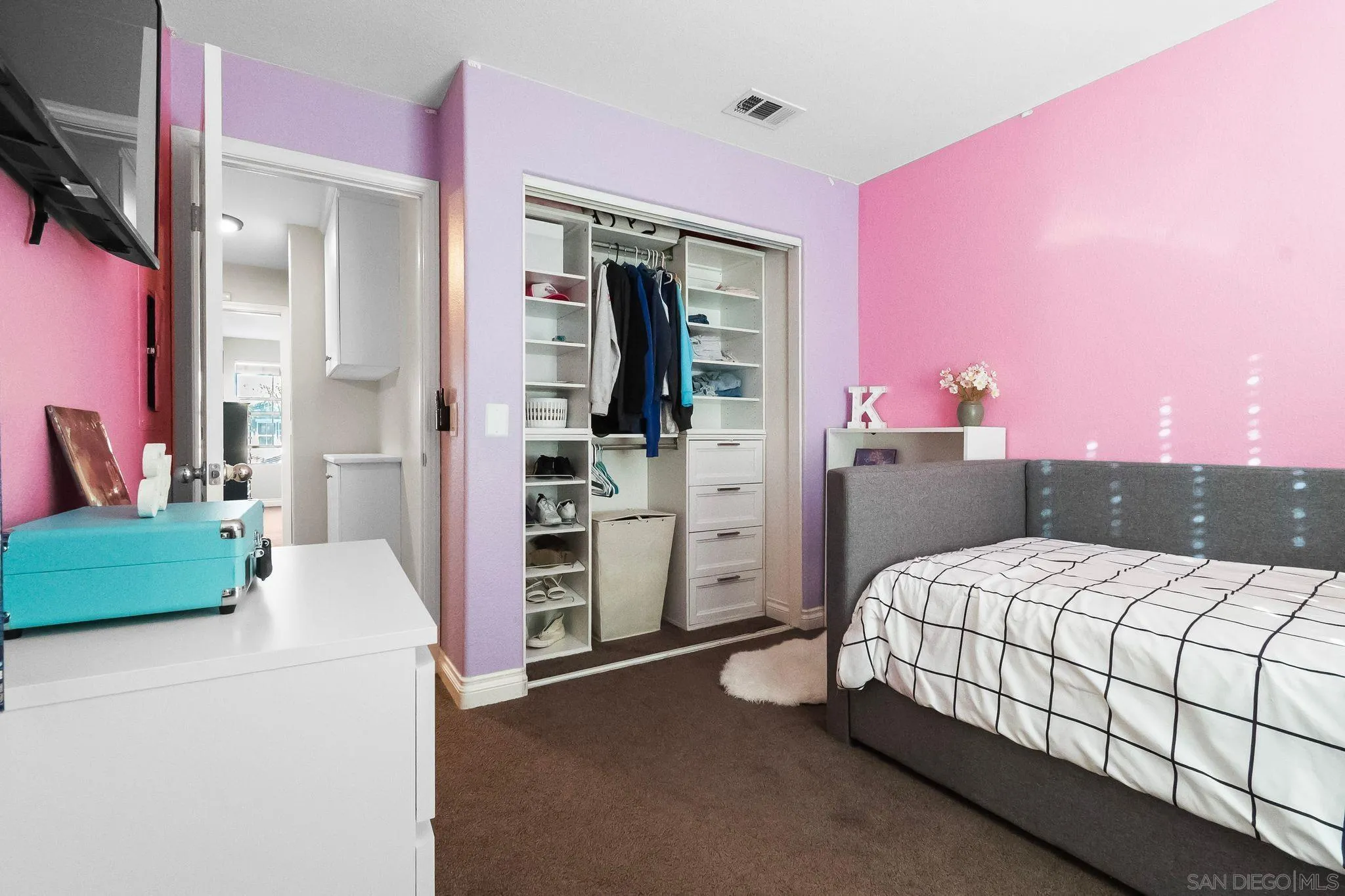 10240 Daybreak Lane, Unit 2 Santee, CA 92071 - Photo 34 of 48 a bedroom with a bed and a dresser