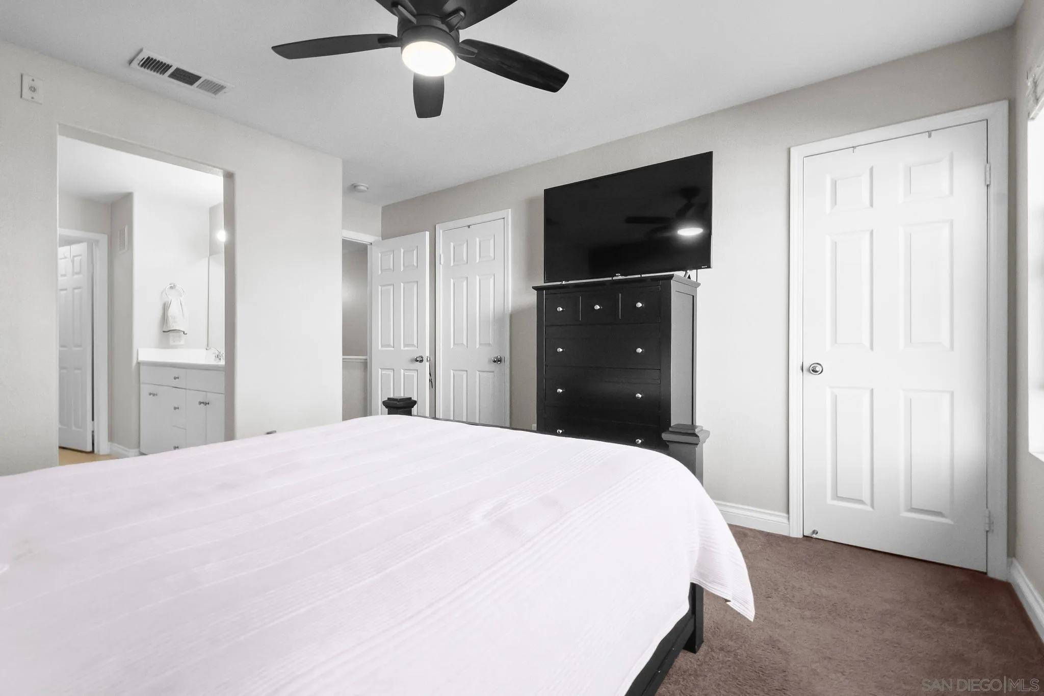 10240 Daybreak Lane, Unit 2 Santee, CA 92071 - Photo 38 of 48 a bed room with a bed and a television