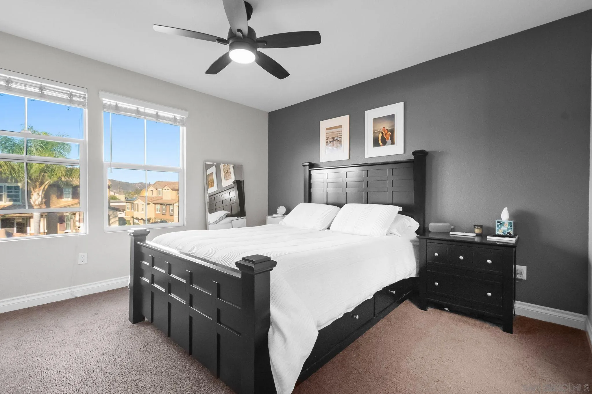 10240 Daybreak Lane, Unit 2 Santee, CA 92071 - Photo 39 of 48 a bedroom with a bed and a large window