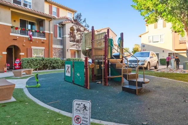 a view of a chairs and table in patio