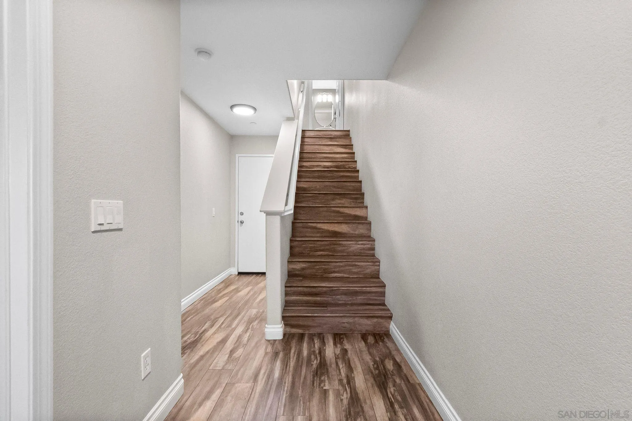 10240 Daybreak Lane, Unit 2 Santee, CA 92071 - Photo 6 of 48 a view of entryway with wooden floor