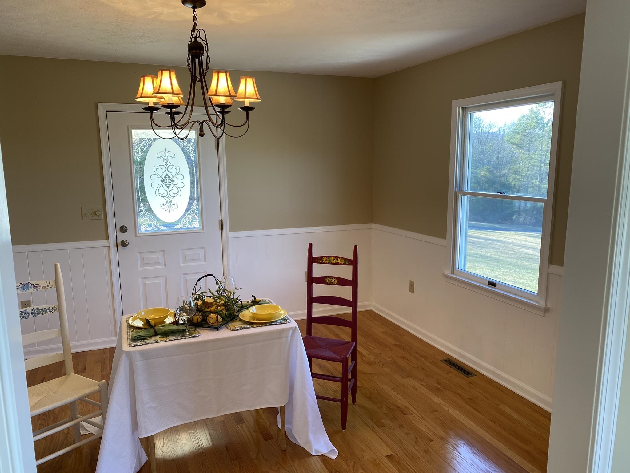 611 Stover Shop Road Churchville, VA 24421 - Photo 19 of 71 a dining room with furniture and window