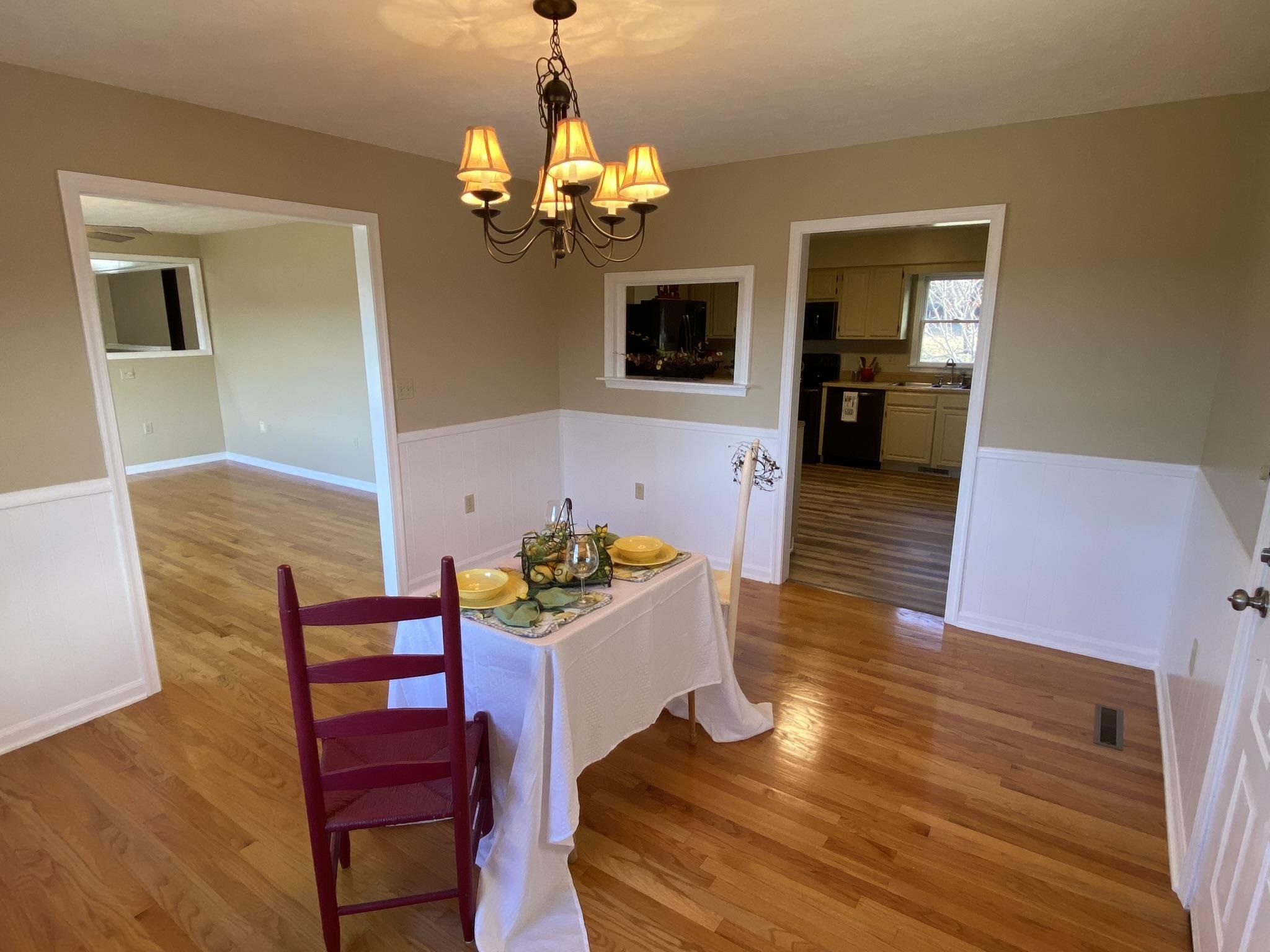 611 Stover Shop Road Churchville, VA 24421 - Photo 20 of 71 a view of a dining room with furniture and wooden floor