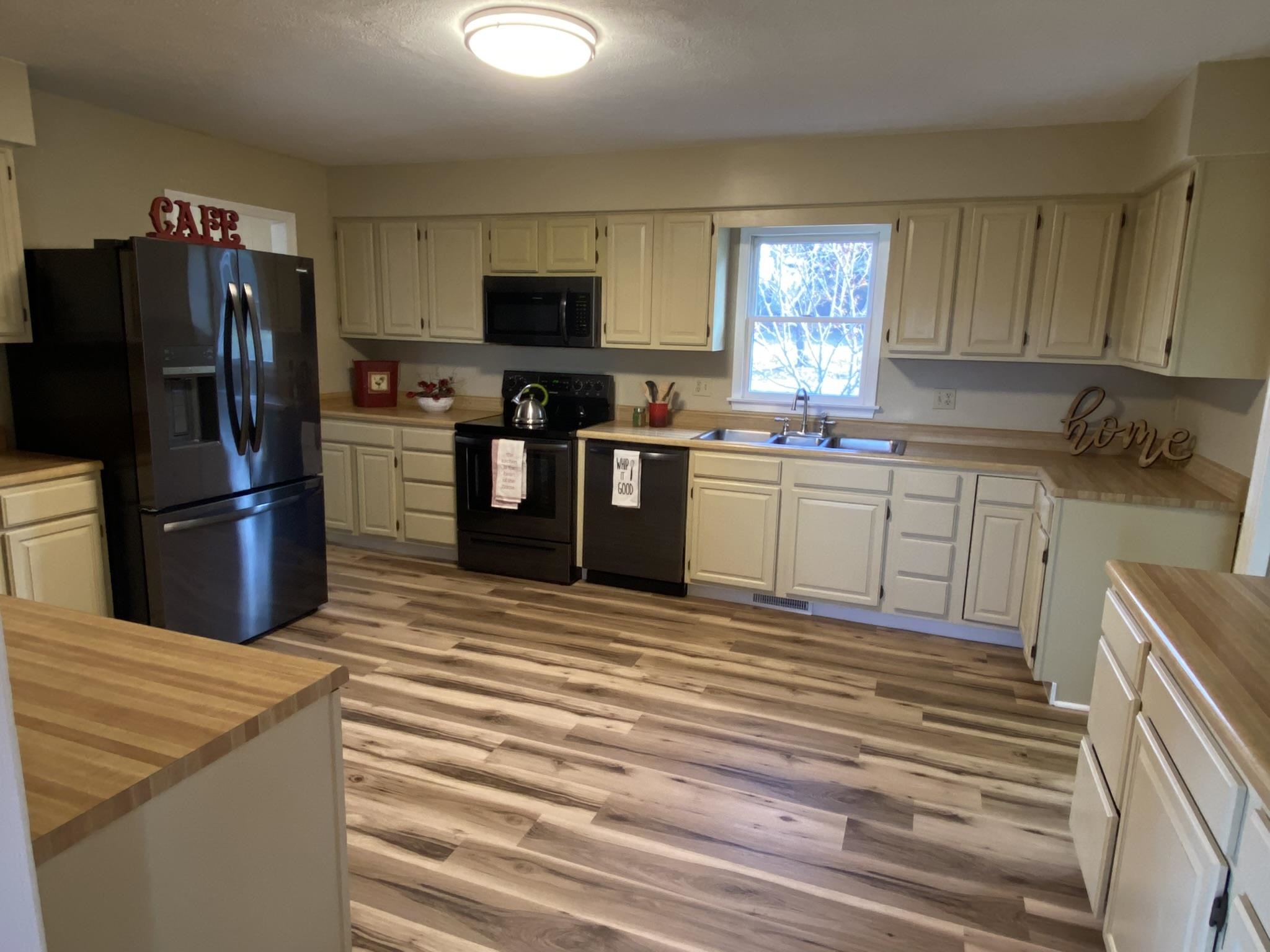 611 Stover Shop Road Churchville, VA 24421 - Photo 24 of 71 a kitchen with stainless steel appliances granite countertop a refrigerator and a stove top oven