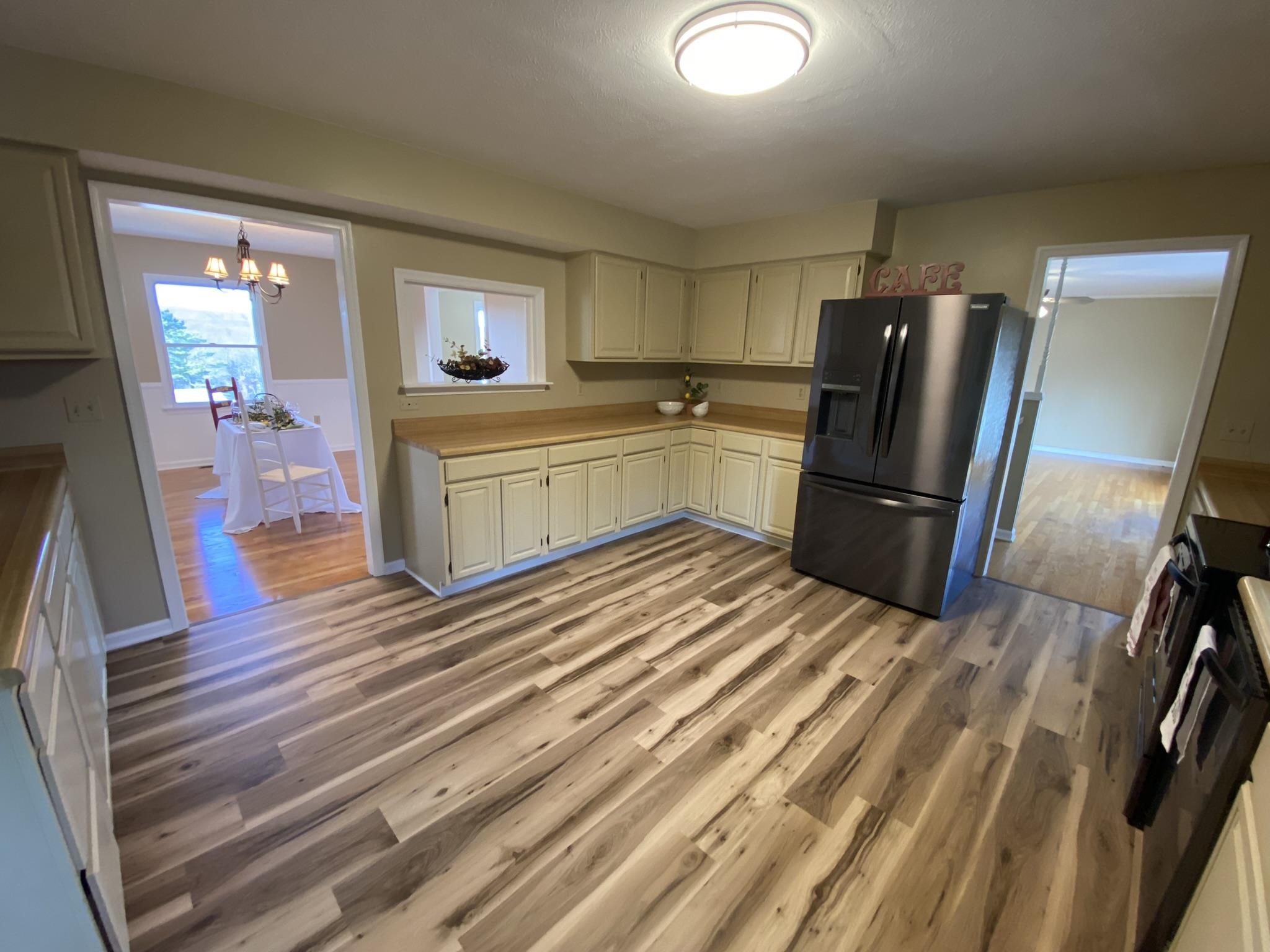 611 Stover Shop Road Churchville, VA 24421 - Photo 25 of 71 a kitchen with a refrigerator and a sink