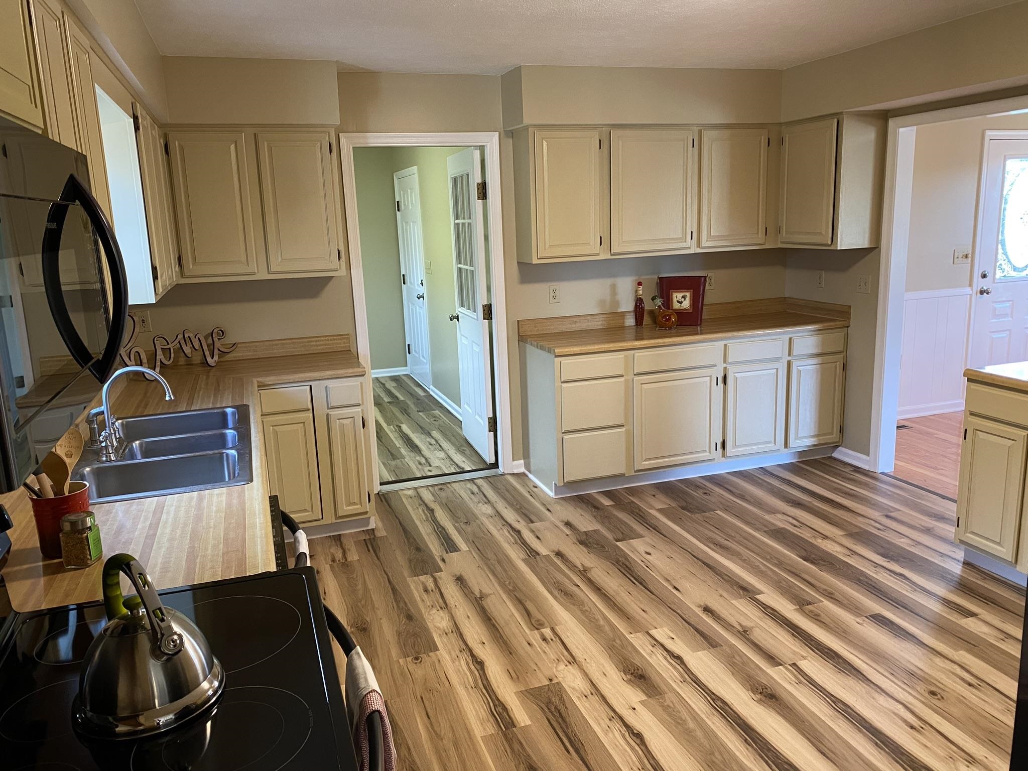 611 Stover Shop Road Churchville, VA 24421 - Photo 26 of 71 a kitchen with a sink appliances and cabinets