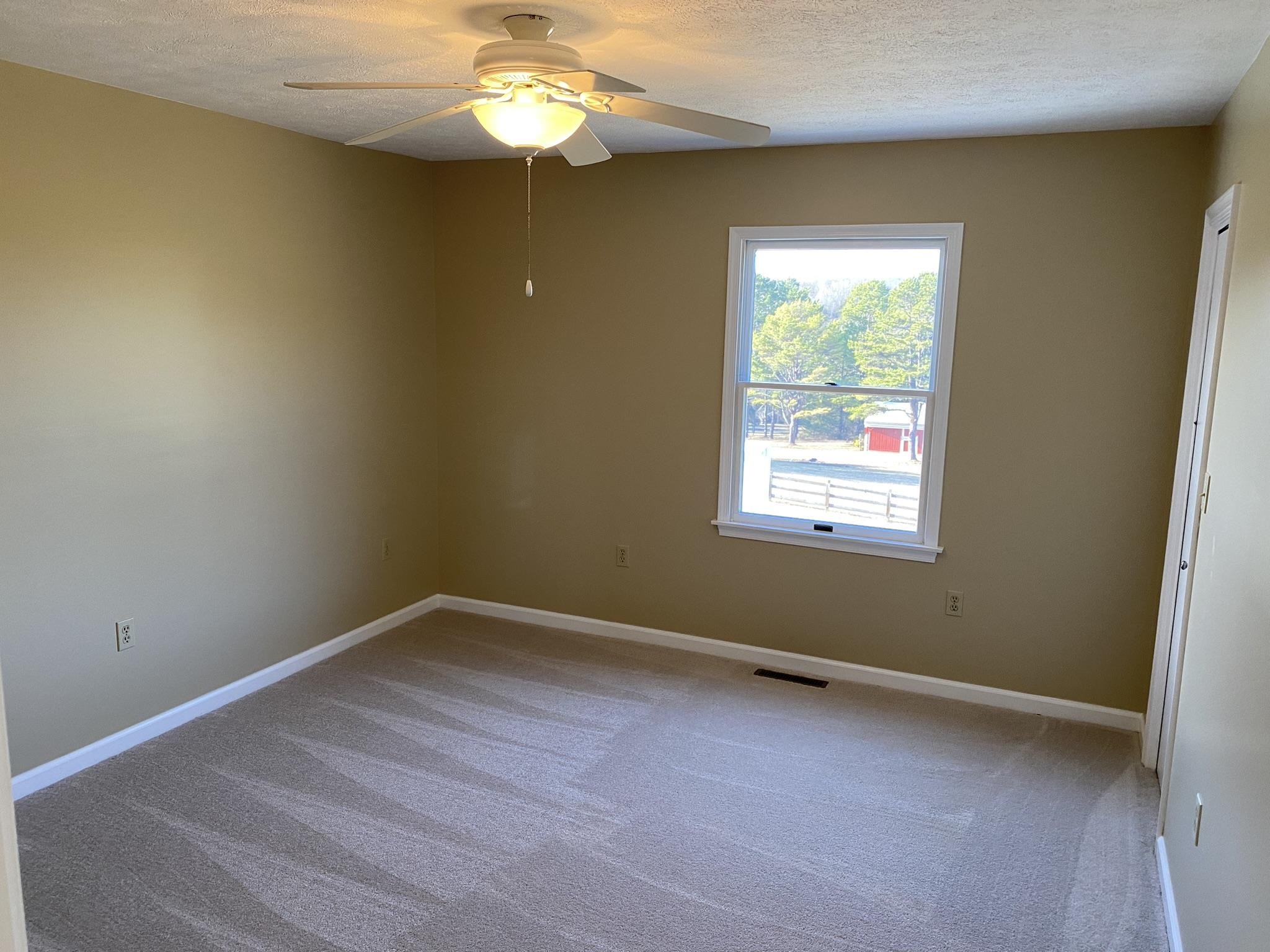 611 Stover Shop Road Churchville, VA 24421 - Photo 41 of 71 a view of an empty room with a window