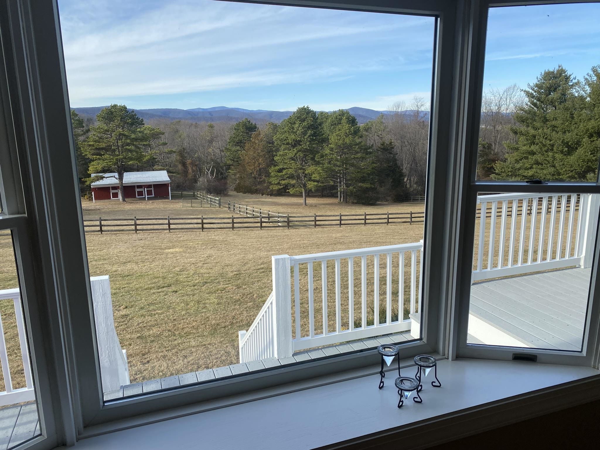 611 Stover Shop Road Churchville, VA 24421 - Photo 51 of 71 a view of a balcony with floor to ceiling window with wooden floor