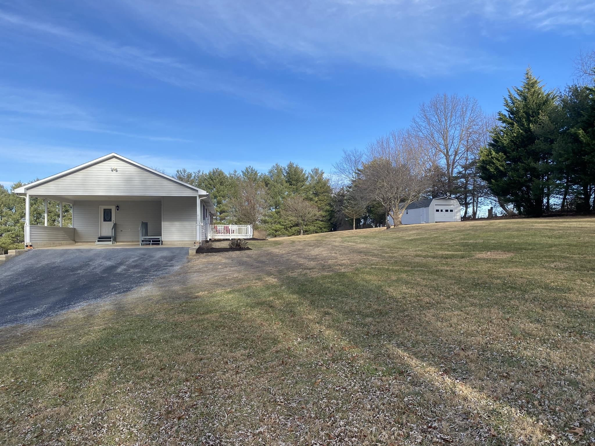 611 Stover Shop Road Churchville, VA 24421 - Photo 55 of 71 a front view of a house with a yard and trees