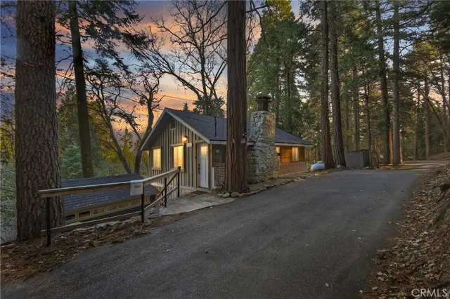 a view of house with outdoor space and street view