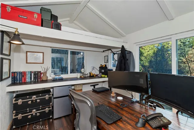 a view of a workspace with furniture