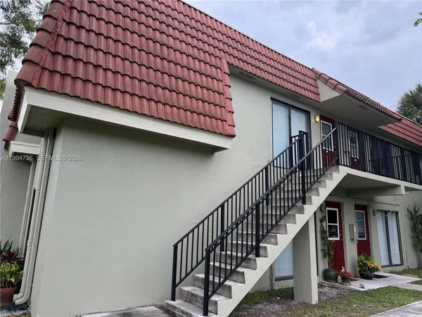a view of entryway with a front door