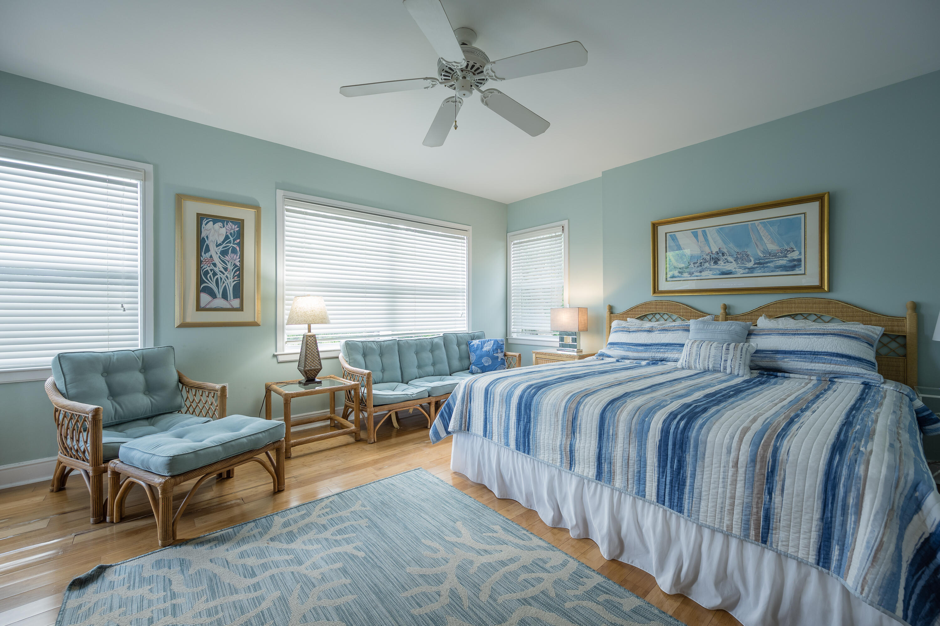 105 Front Street, Unit 119 Key West, FL 33040 - Photo 4 of 6 a bedroom with a bed and a couch