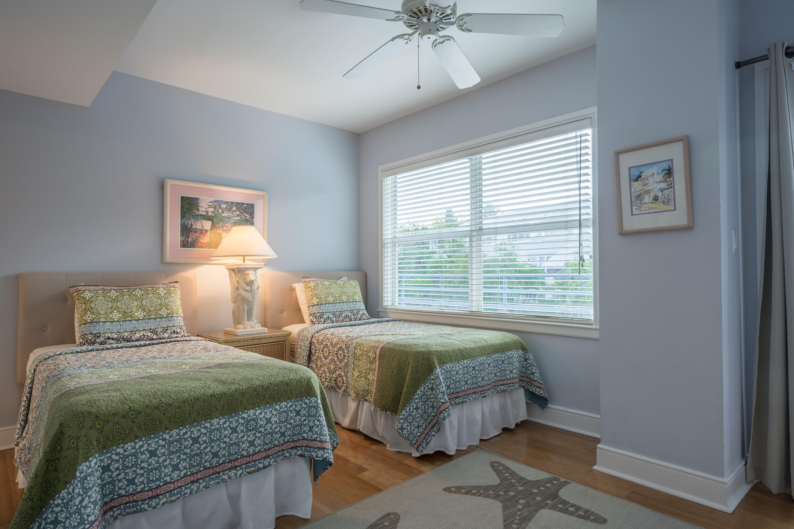105 Front Street, Unit 119 Key West, FL 33040 - Photo 5 of 6 a bedroom with double bed and a window