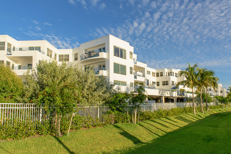 105 Front Street, Unit 119 Key West, FL 33040 - Photo 6 of 6 a front view of a house with a yard