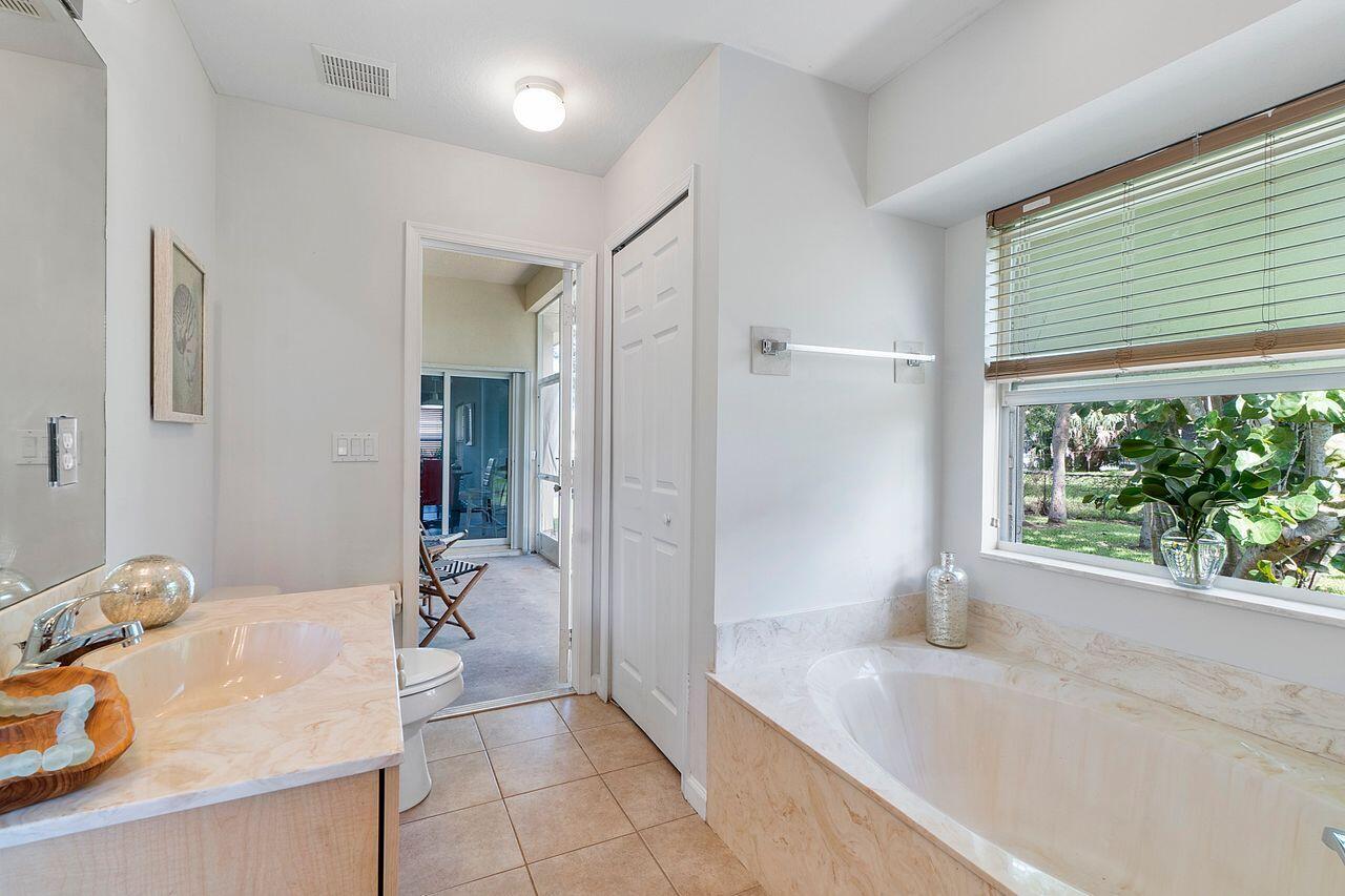 2655 Southwest Ace Road Port St. Lucie, FL 34953 - Photo 40 of 43 Primary Bathroom-Cabana Door
