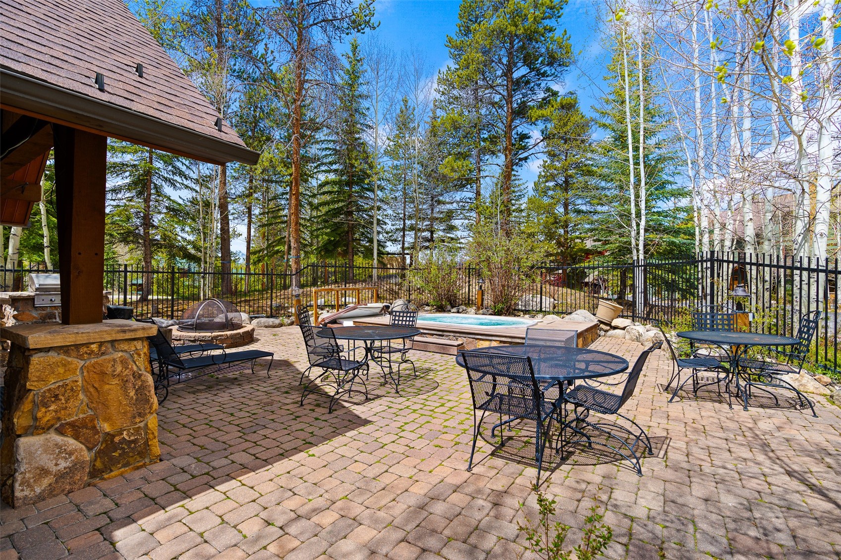57 Lake Ridge Circle, Unit 1848 Keystone, CO 80435 - Photo 36 of 49 a backyard of a house with outdoor seating