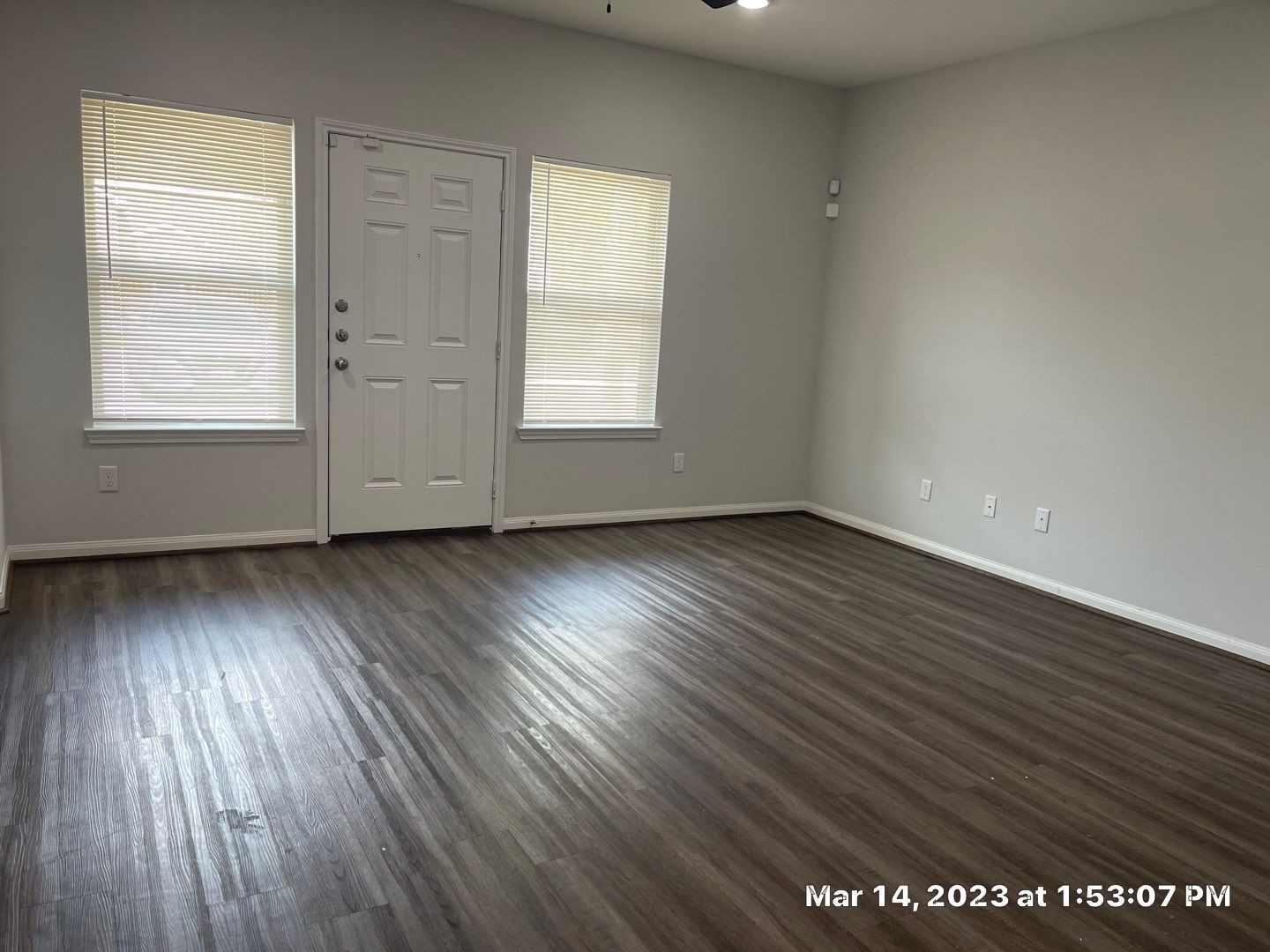 9014 Everglade Drive, Unit B Houston, TX 77078 - Photo 15 of 22 an empty room with wooden floor and windows