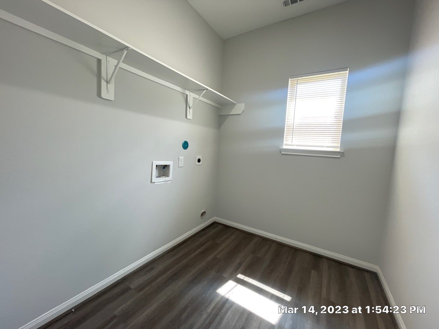 9014 Everglade Drive, Unit B Houston, TX 77078 - Photo 19 of 22 a view of a hallway with wooden floor and a window