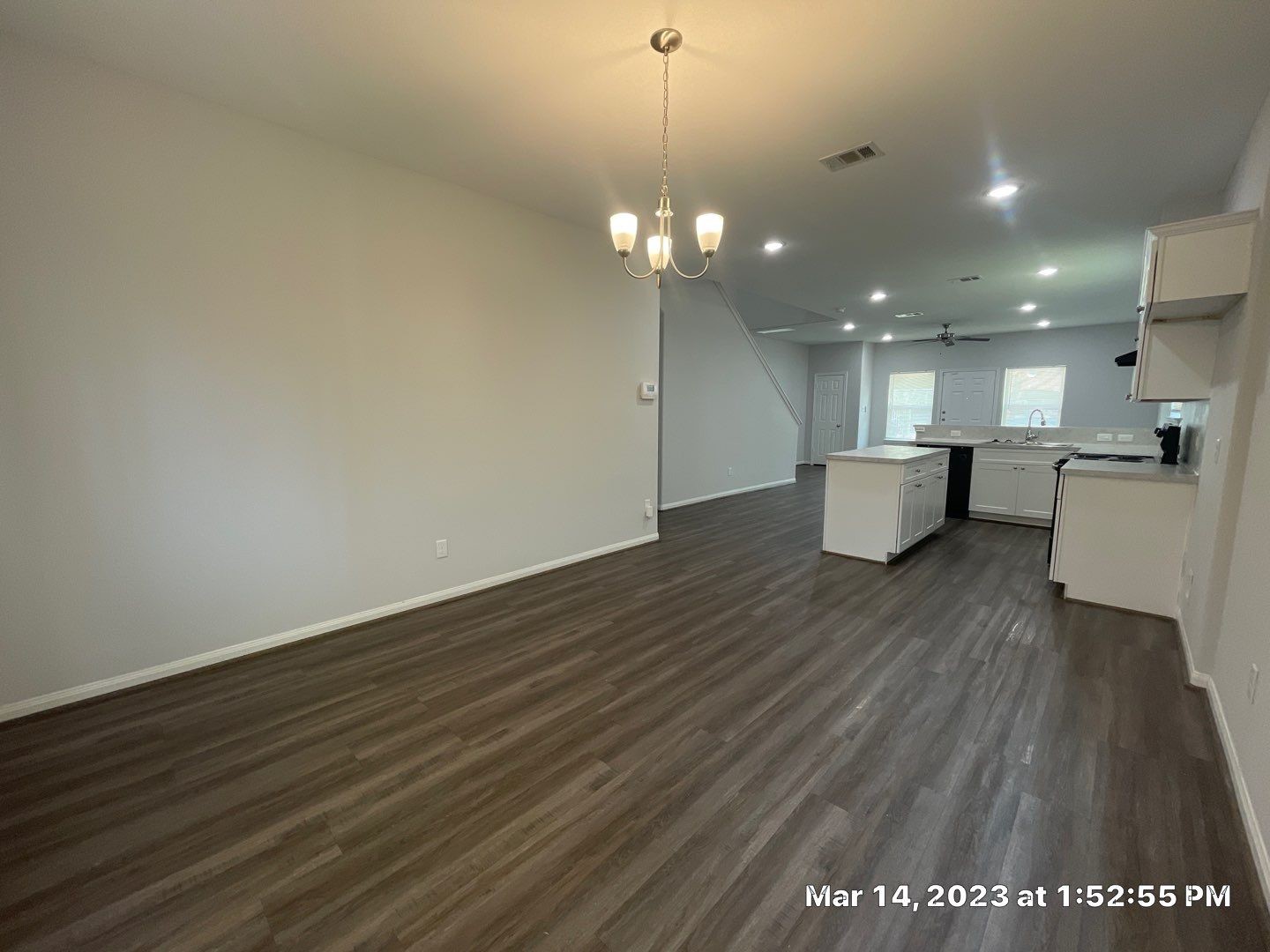 9014 Everglade Drive, Unit B Houston, TX 77078 - Photo 5 of 22 a view of a room with wooden floor and kitchen view