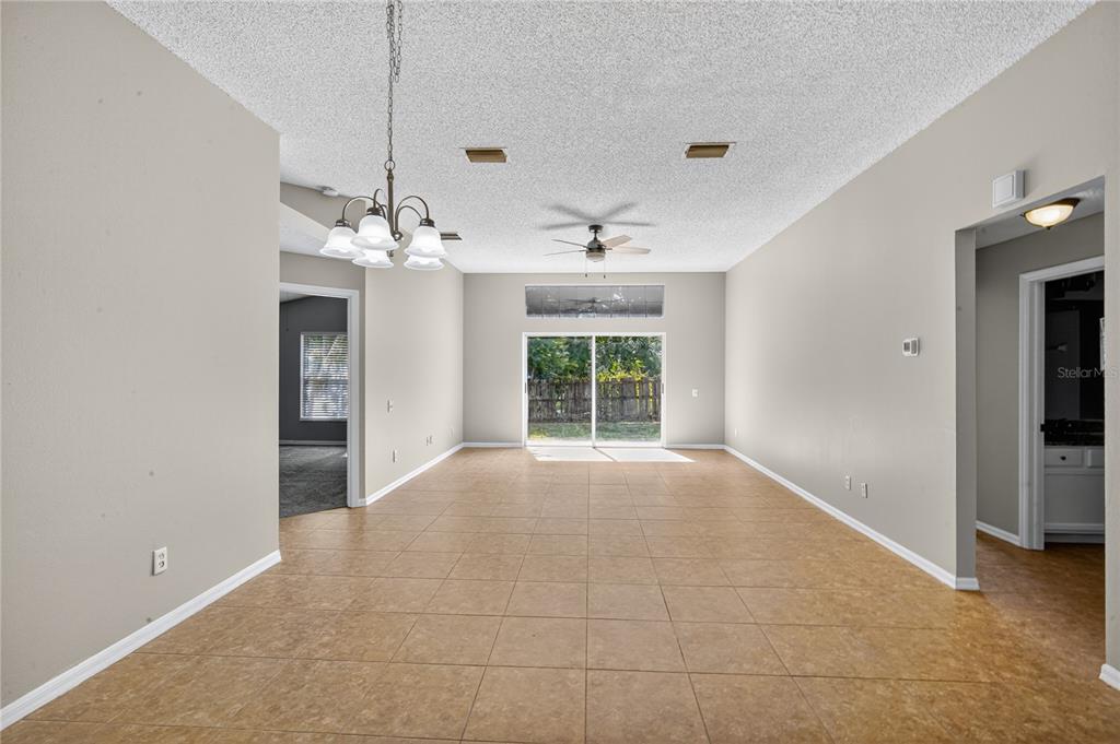 12630 Early Run Lane Riverview, FL 33578 - Photo 11 of 32 a view of an empty room with a window