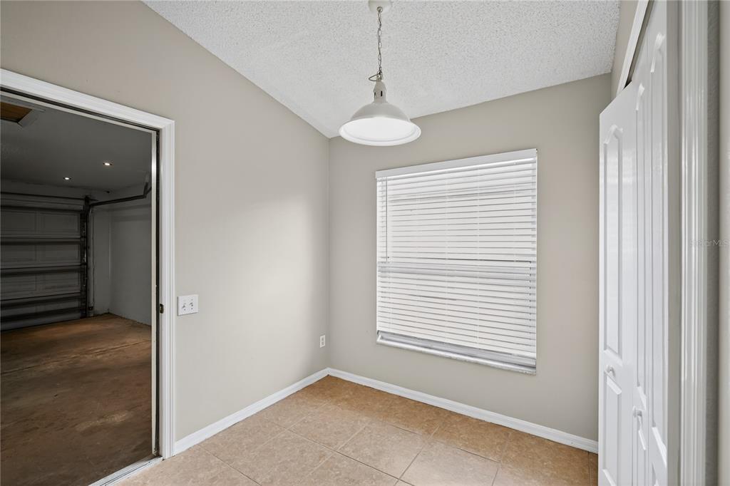 12630 Early Run Lane Riverview, FL 33578 - Photo 18 of 32 a view of an empty room with a window
