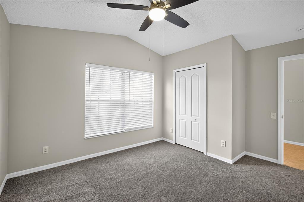 12630 Early Run Lane Riverview, FL 33578 - Photo 20 of 32 a view of an empty room with a window