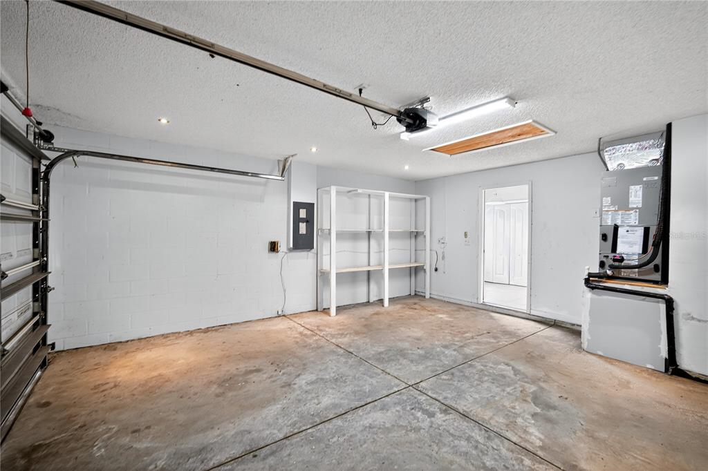 12630 Early Run Lane Riverview, FL 33578 - Photo 30 of 32 a view of a kitchen with a sink and a refrigerator