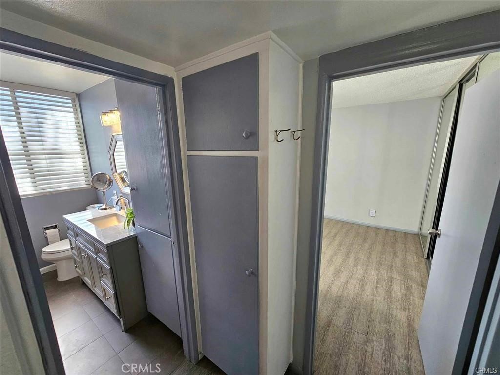 6979 Palm Court, Unit 126H Riverside, CA 92506 - Photo 14 of 25 a room with storage and utility