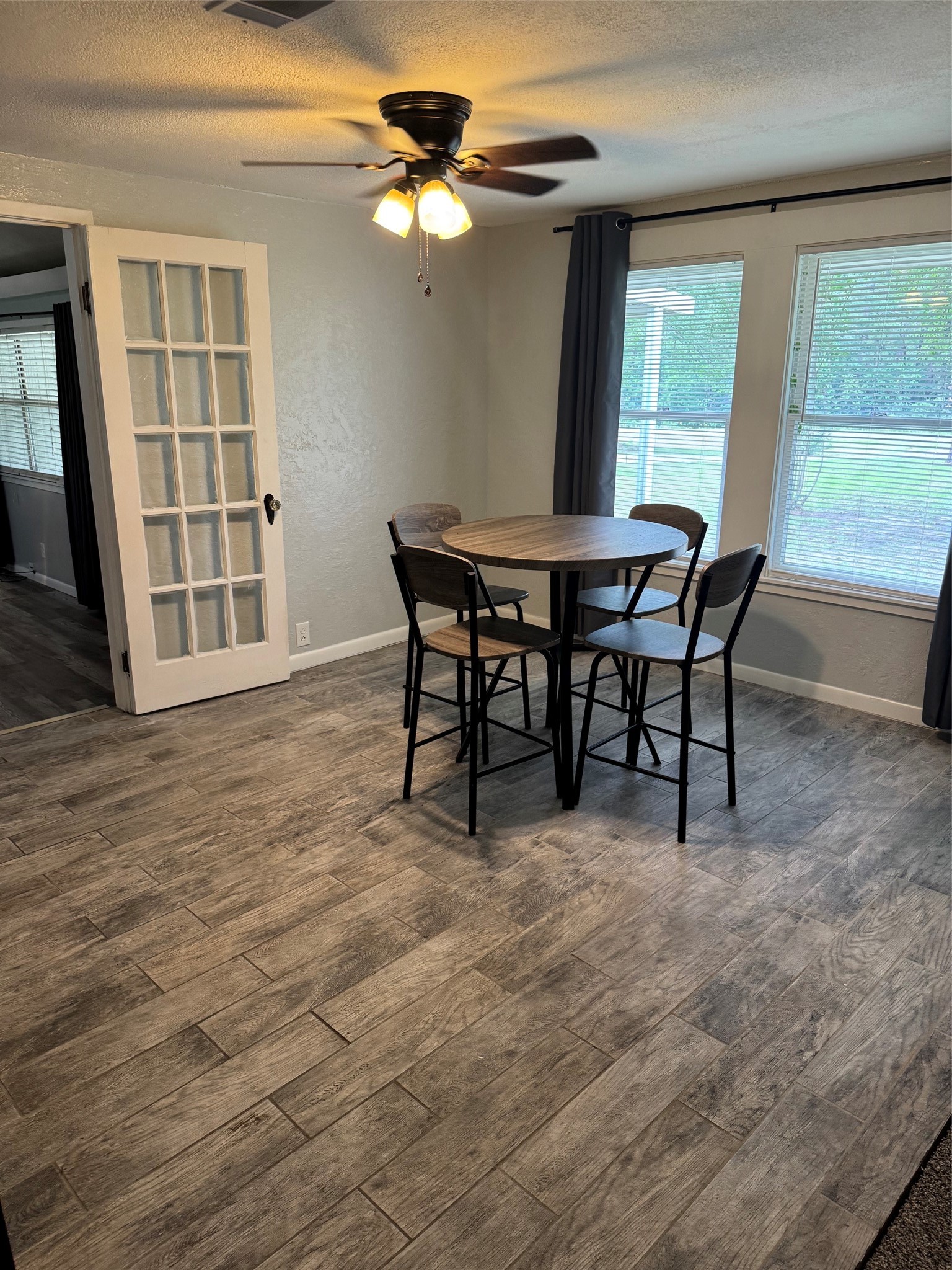 9004 Farm To Market 62 Corrigan, TX 75939 - Photo 11 of 27 a view of a dining room with furniture window and outside view