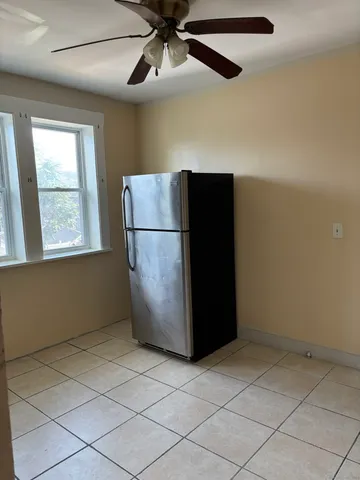 a refrigerator freezer sitting in a kitchen