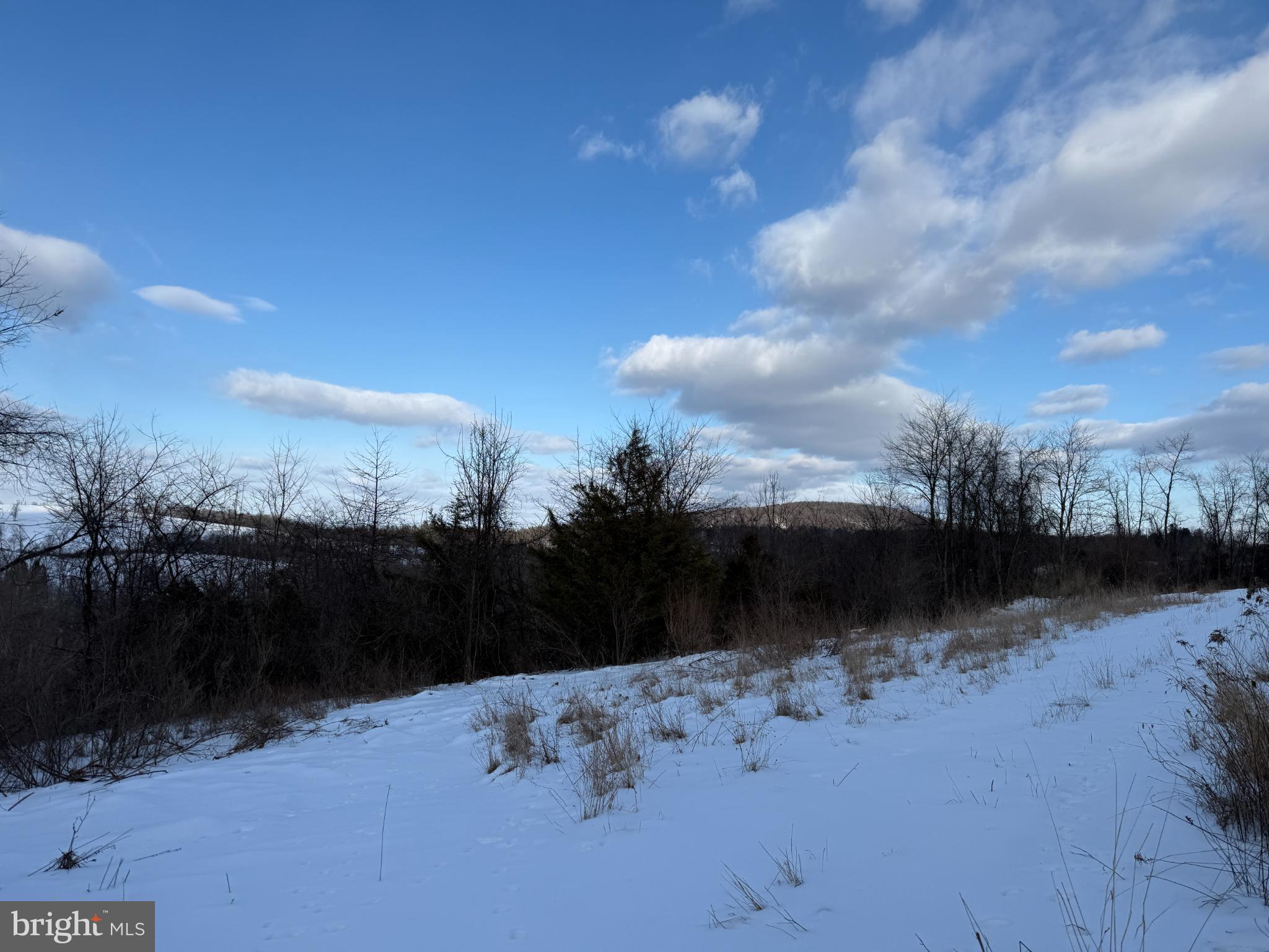 a view of outdoor space with mountain view