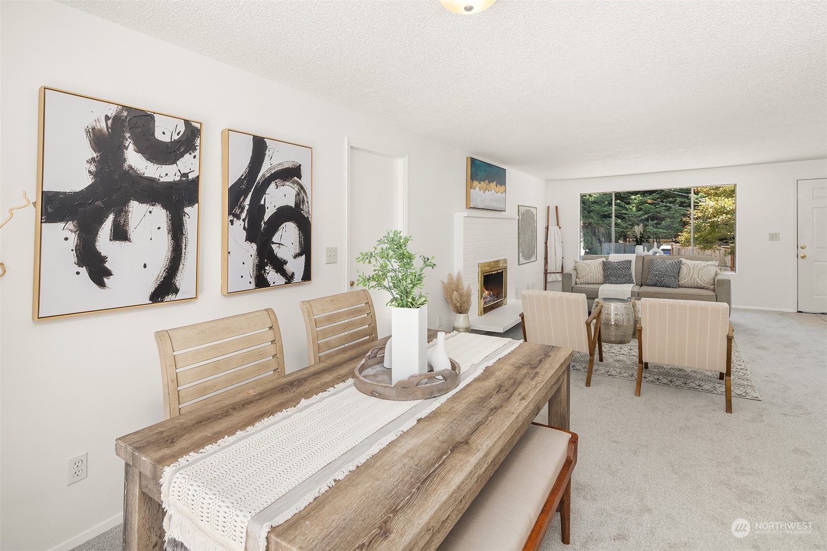 2525 Edmonds Avenue Northeast Renton, WA 98056 - Photo 7 of 17 a living room with furniture and a large window