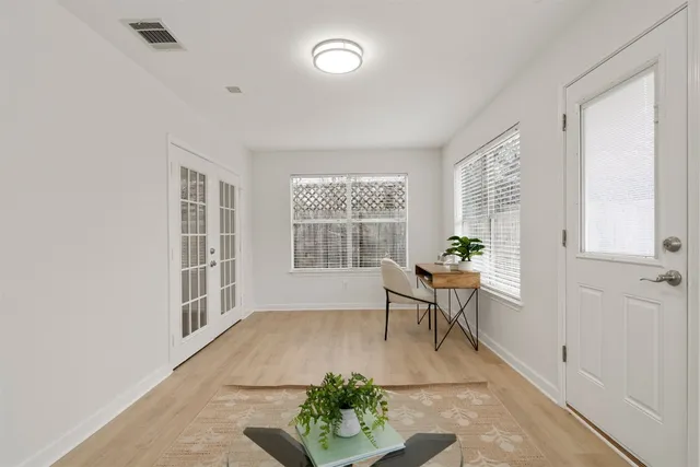 a view of a livingroom with furniture and window