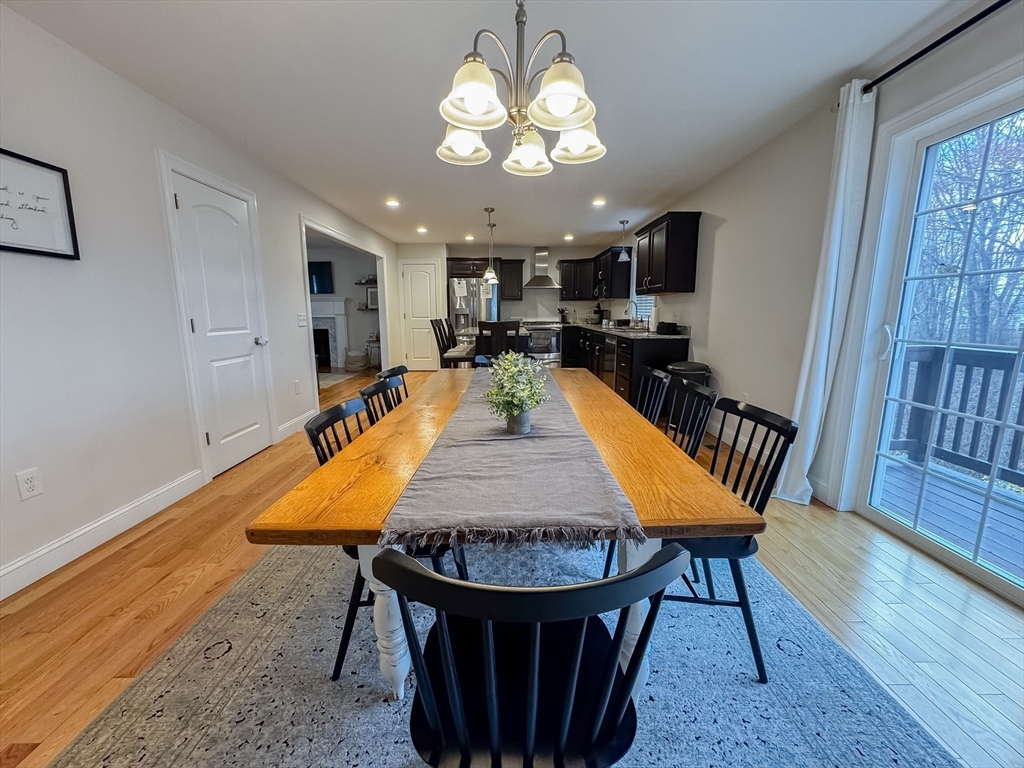 23 Ralph Street Chicopee, MA 01020 - Photo 9 of 42 a view of a dining room with furniture window and wooden floor