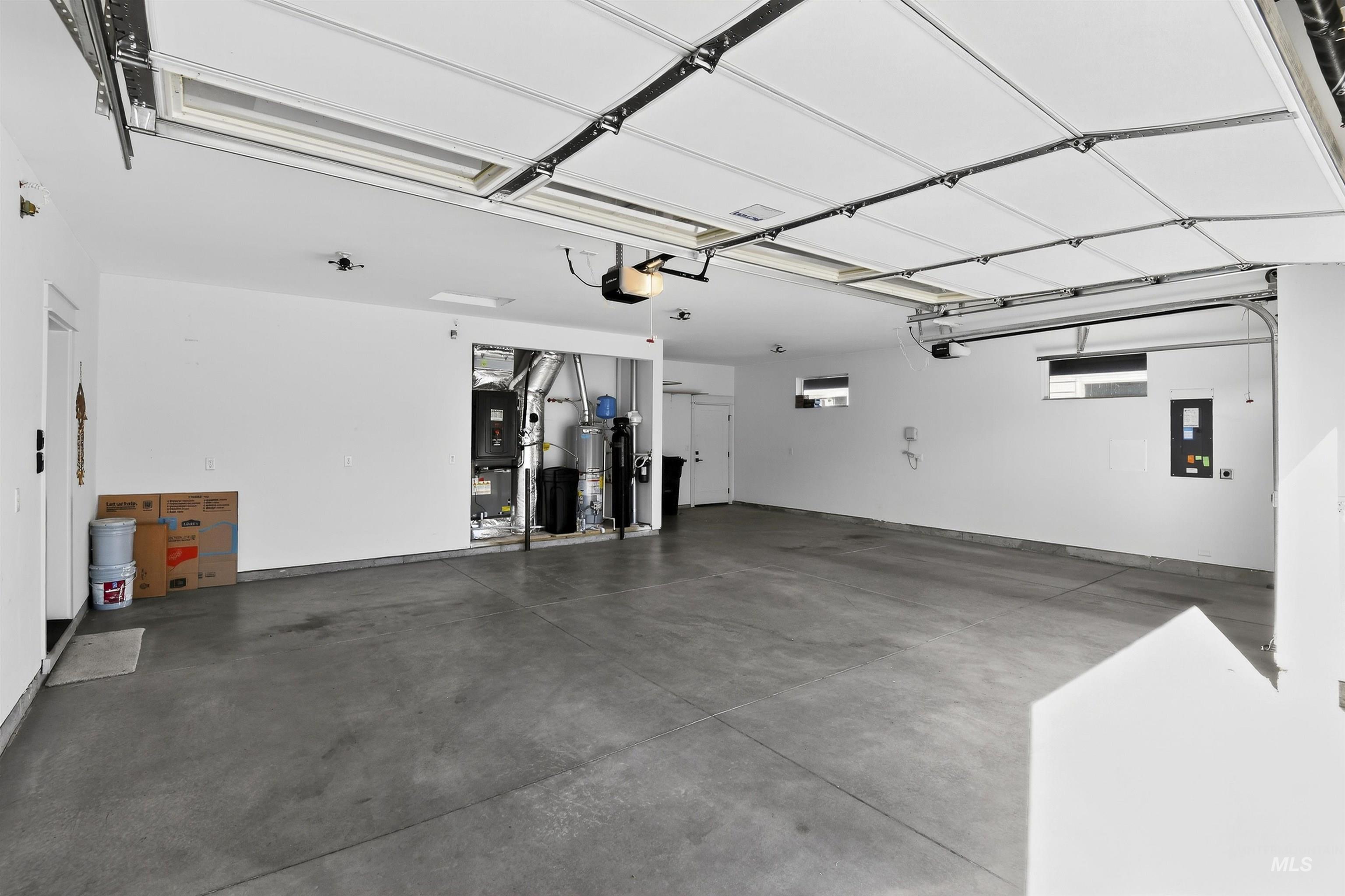 6839 North Willowside Avenue Meridian, ID 83646 - Photo 29 of 38 Garage featuring electric panel