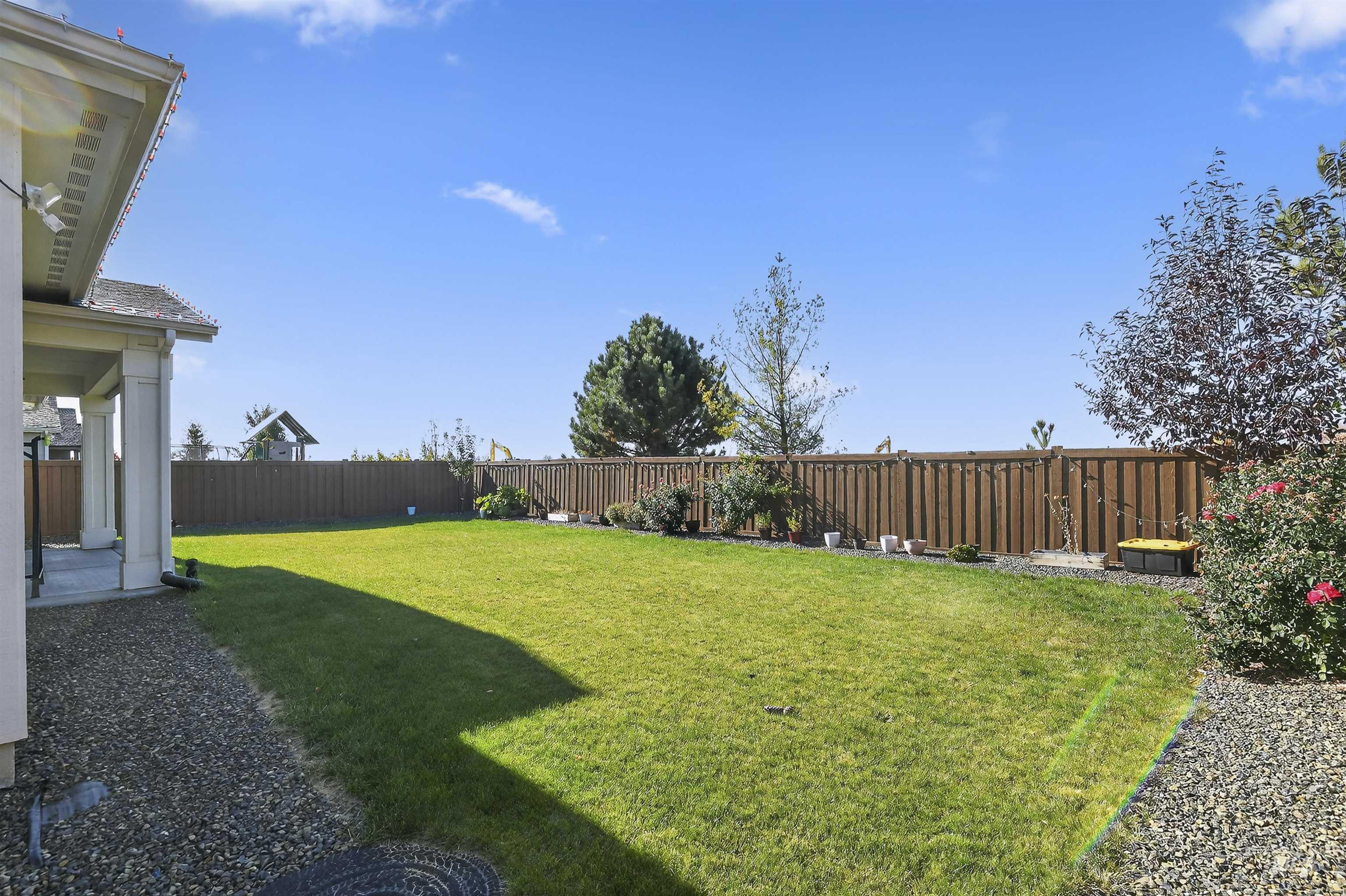 6839 North Willowside Avenue Meridian, ID 83646 - Photo 32 of 38 Fenced backyard with a patio