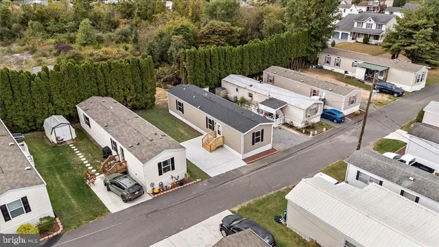 an aerial view of a house with outdoor space