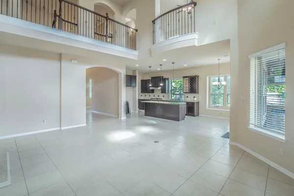 a view of an entryway with a kitchen