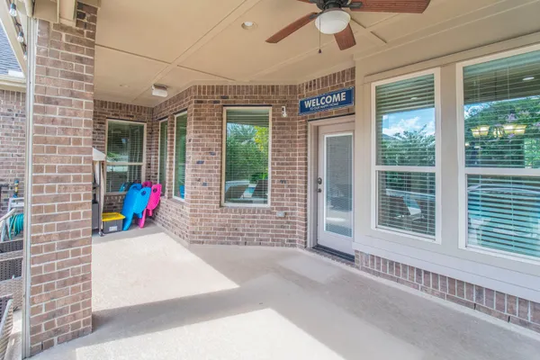 a view of a livingroom with a patio and a yard